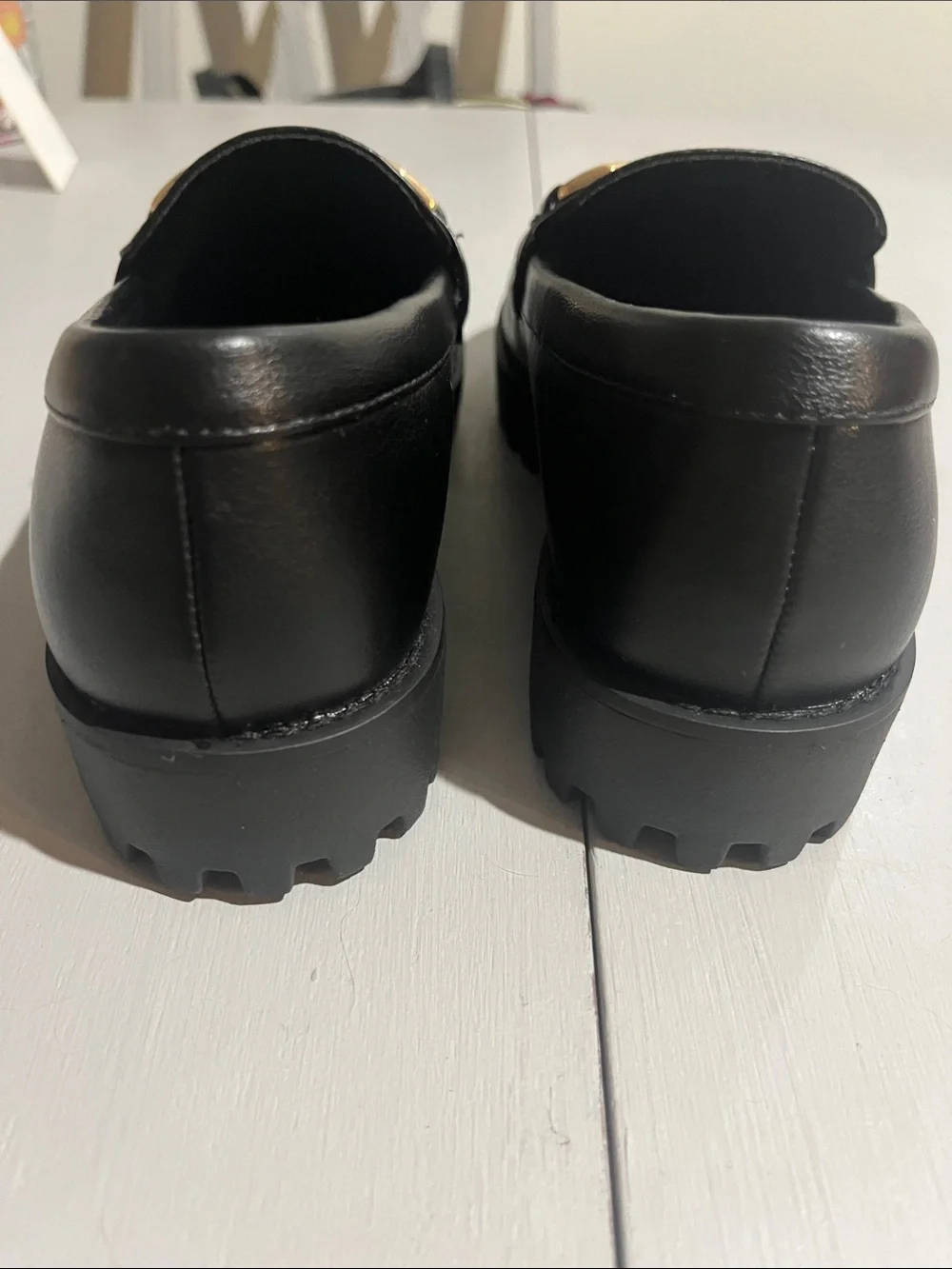 Black Platform Loafers with Gold Hardware